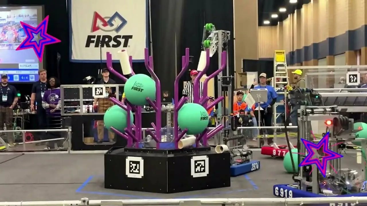 Robot 2974 and an alliance partner beside the reef at an event